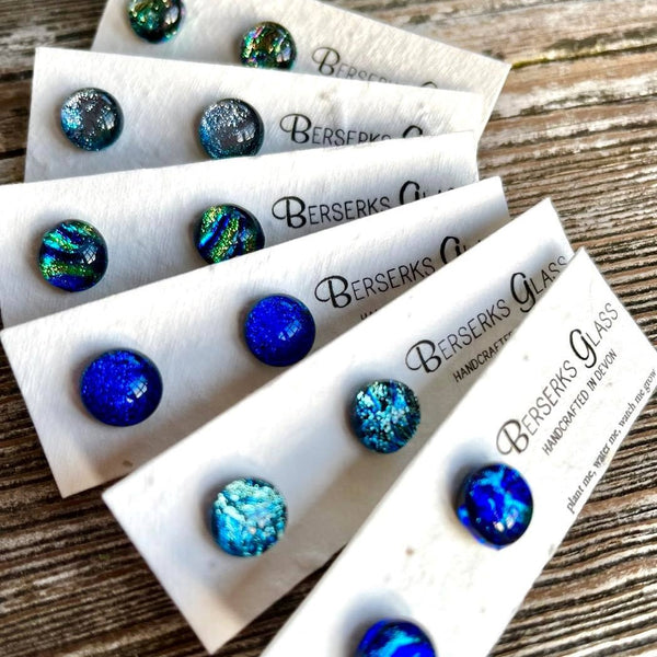 Stud Earrings in Dichroic glass, displayed on wildflower seeded card.