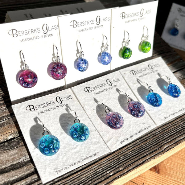 Drop Earrings in Dichroic or Bubble glass, displayed on wildflower seeded card.