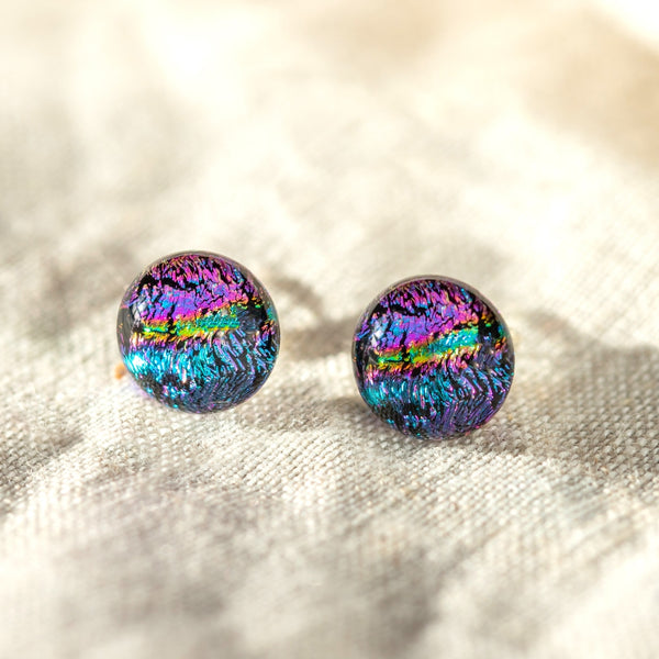 Stud Earrings in Dichroic glass, displayed on wildflower seeded card.