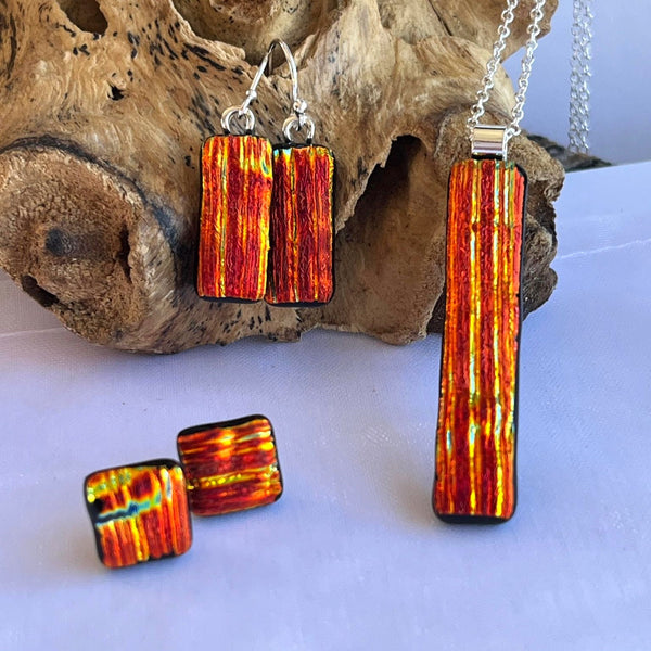 New for 2024 A dazzling and unique design in chunky dichroic stud earrings.