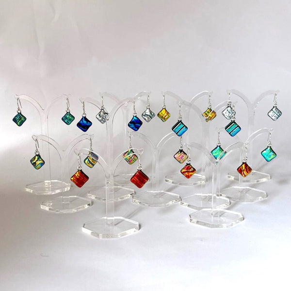 New for 2024 A dazzling and unique design in dichroic drop earrings.