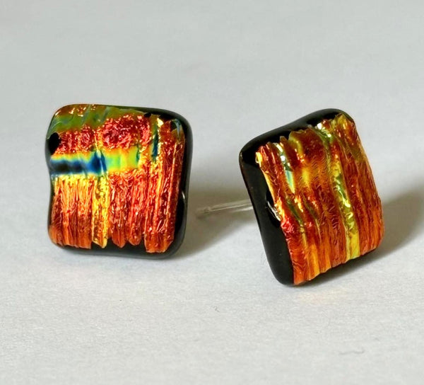 New for 2024 A dazzling and unique design in chunky dichroic stud earrings.