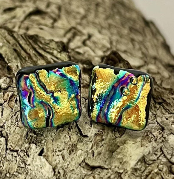 New for 2024 A dazzling and unique design in chunky dichroic stud earrings.