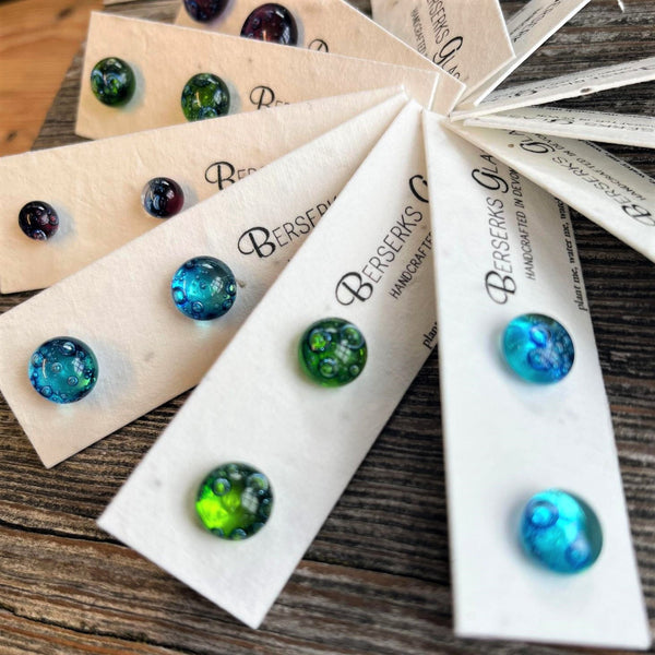 Stud Earrings in bubbles glass, displayed on wildflower seeded card.